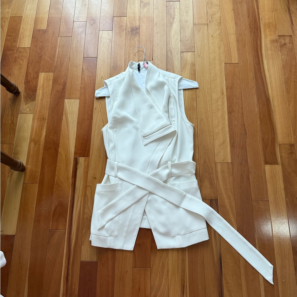 Marciano white sleeveless top.